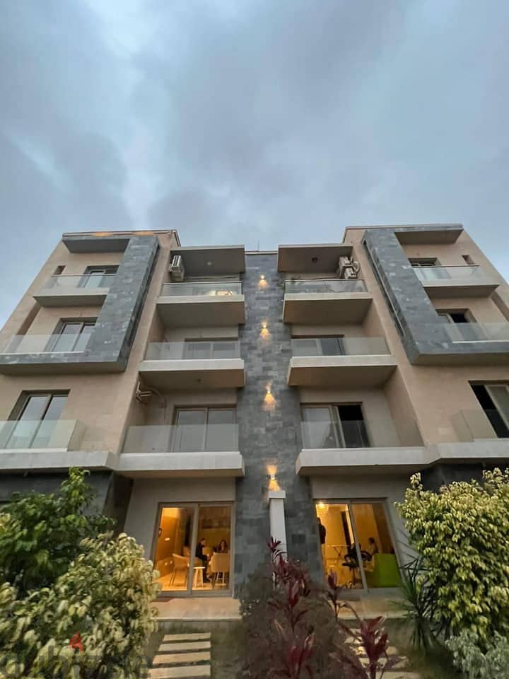 Fully finished ground floor apartment with garden in Galleria Compound near the American University Immediate receipt Swimming pool view 2