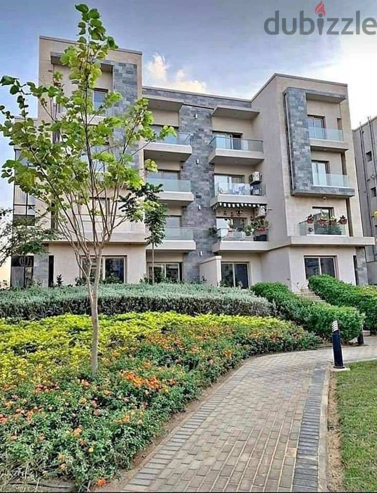 Fully finished ground floor apartment with garden in Galleria Compound near the American University Immediate receipt Swimming pool view 3