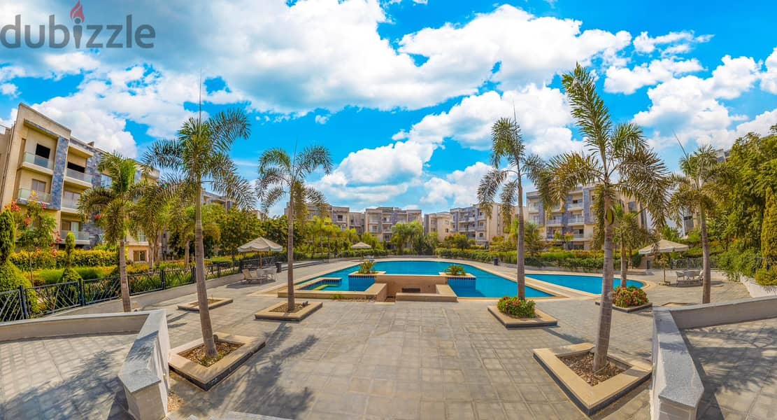 Fully finished ground floor apartment with garden in Galleria Compound near the American University Immediate receipt Swimming pool view 9