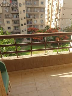 Furnished apartment for rent in Madinaty, 89 meters, in B6, a distinguished floor, with a wide garden view, next to services