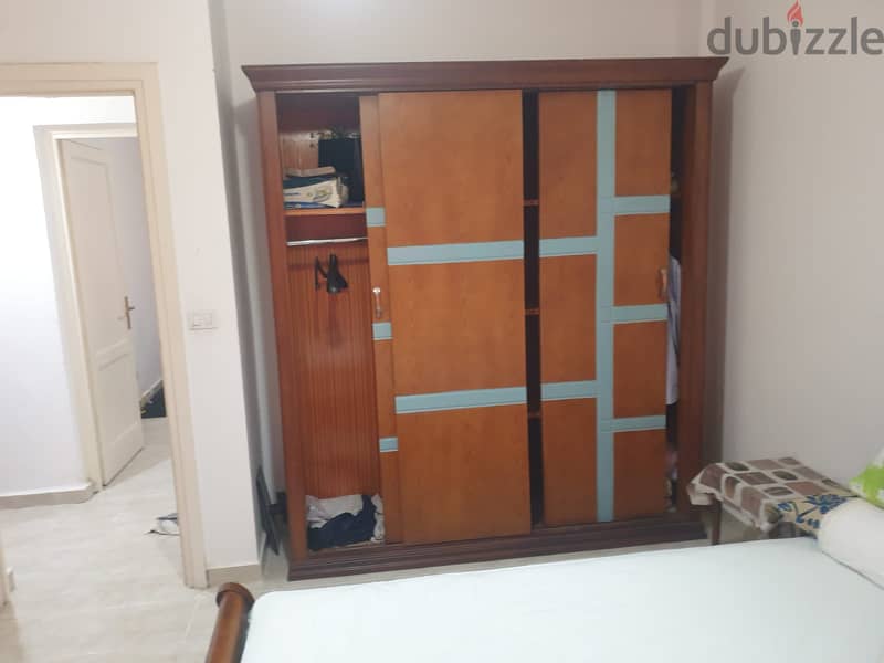 Furnished apartment for rent in Madinaty, 89 meters, in B6, a distinguished floor, with a wide garden view, next to services 5