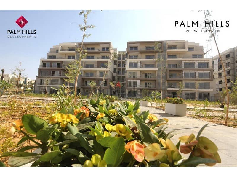 Apartment for sale in Palm Hills New Cairo with a down payment of 676,500 in the heart of the Fifth Settlement, with an installment of 8 years 6