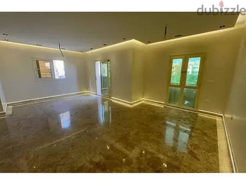 Apartment for sale in Palm Hills New Cairo with a down payment of 676,500 in the heart of the Fifth Settlement, with an installment of 8 years 9