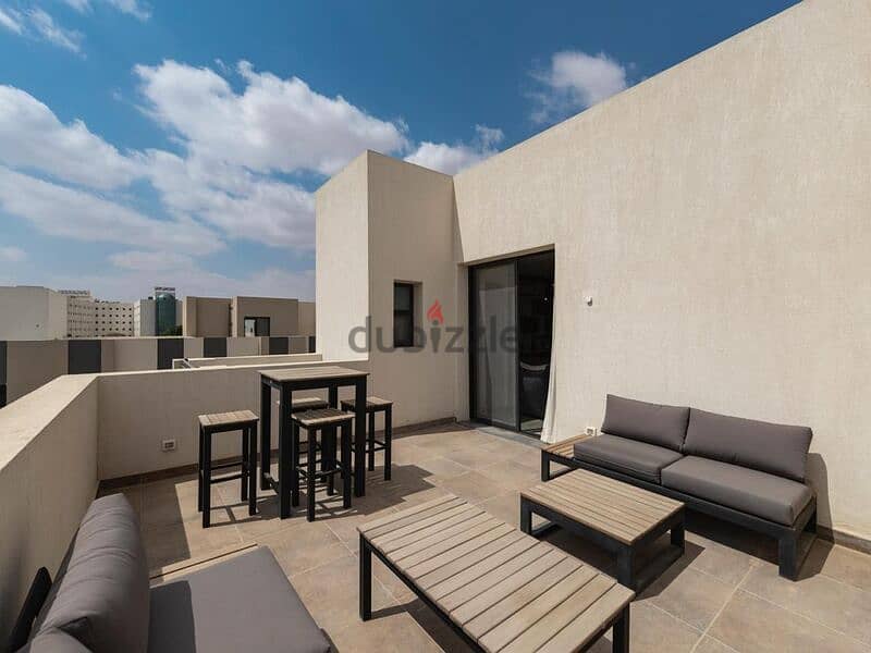 Townhome villa for sale in installments in Al Burouj Compound next to the International Medical Center 2