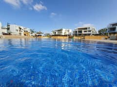 شاليه أرضي للبيع في سيشيل الساحل الشمالي متشطب بالكامل بحديقة خاصة فيو على حمام السباحة مباشر على اللاجون Seashell
