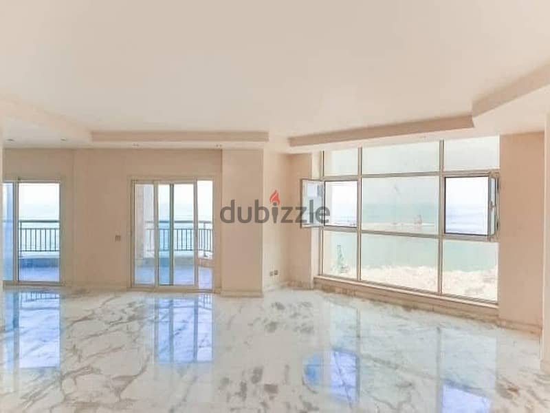 Fully finished double apartment for sale, immediate delivery in installments over 7 years, in the Latin Quarter, next to El Alamein Towers 2