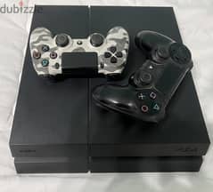 PlayStation 4 PS4 with 2 controllers and 8 games