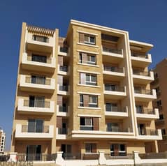 2BR apartment for sale in front of Cairo Airport in a prime location in Taj City Compound, with a 39% discount and a view on the landscape.