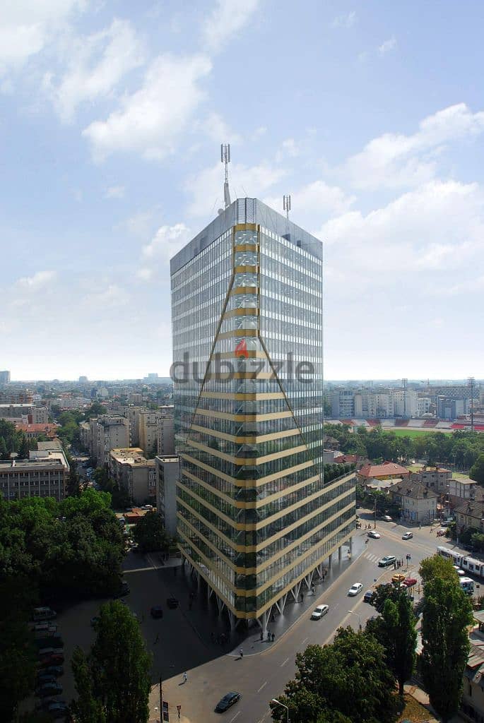 With a down payment of only 200,000, a wonderful office in OURO TOWER- New Capital ,and installments over 10 years 5