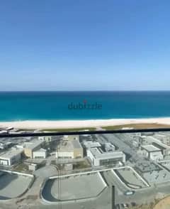 Apartment for sale in Double View Lagoon and Sea, fully finished, in New Alamein Towers