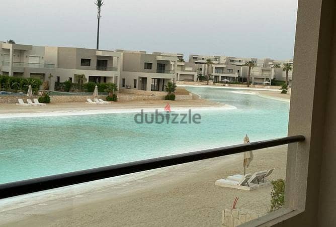 first row on crystal lagoon - sea view  2 bedrooms chalet for sale in azha north coast ,ras el hekma ,finished +kitchen + ACS madaar company , 0