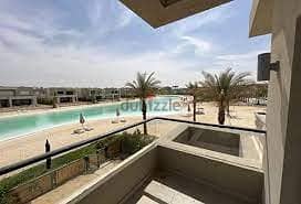 first row on crystal lagoon - sea view  2 bedrooms chalet for sale in azha north coast ,ras el hekma ,finished +kitchen + ACS madaar company , 12