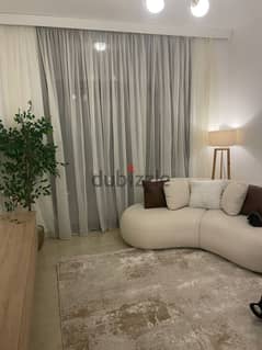 Furnished apartment for sale with air conditioners, prime location, landscaped view 0