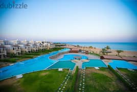Ground chalet with garden on the sea, finished, ultra super luxury, with installments over 8 years, in BlueBlue, Ain Sokhna