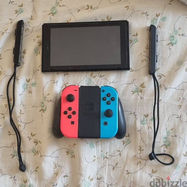 Nintendo Switch V2 + 2 wireless controllers 1