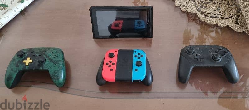 Nintendo Switch V2 + 2 wireless controllers 2