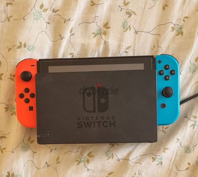 Nintendo Switch V2 + 2 wireless controllers 3