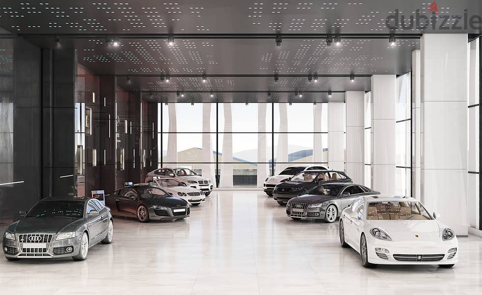 For sale, a 374 sqm car showroom on the front of the mall in the heart of Sheikh Zayed, near Beverly Hills, in installments. 1