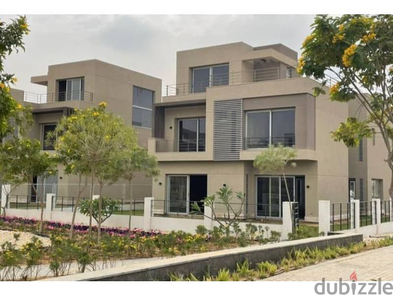 Townhouse for sale, semi-finished, with private roof, in the best location in New Cairo 2