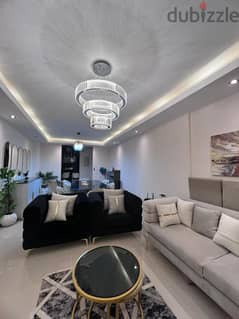 ound floor apartment with garden for sale in The Address East Compound, by Dorra Group  first stage   Ultra super luxury finishing