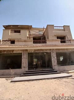 1000 sqm villa for sale in Flowers Park Compound in front of Al-Rehab Gate 5 with a swimming pool