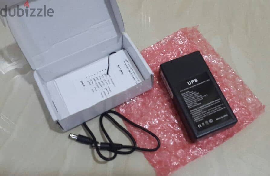 جهاز بطارية Mini UPS 9V/1A للراوتر أو كاميرا مراقبة وحاله جديدة 2