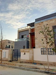 For sale, a villa of 143 square meters with a garden of 110 square meters inside the Taj City Compound in an excellent location in New Cairo in front