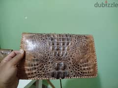 شنط ومحافظ جلد تمساح وجلد ثعبان طبيعى handmade