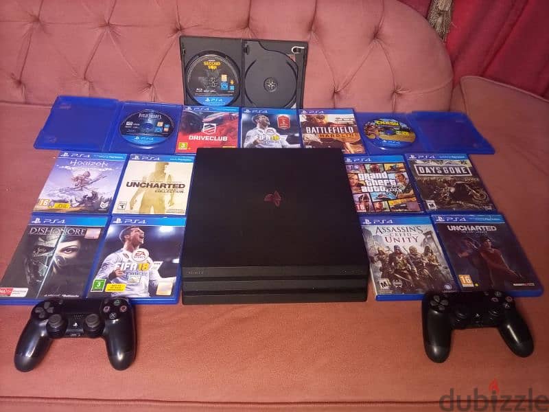 جهاز ps4 برو 1 تيرا ومعاه 13 اسطوانه 2