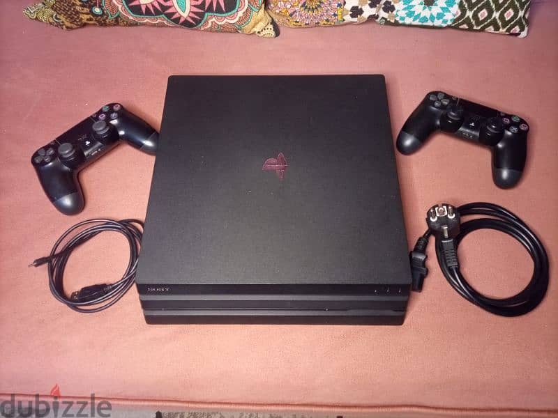 جهاز ps4 برو 1 تيرا ومعاه 13 اسطوانه 5