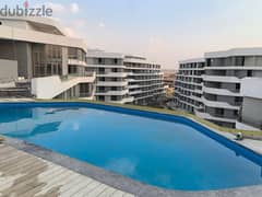 شقة في بلومفيلدز مدينة المستقبل تطل على المساحات الخضراء والمناظر الطبيعية وحمام السباحة على سطح المبنى  Bloomfields el Mostakbal City