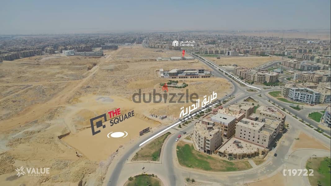 A shop for sale on the ground floor in the best location in Shorouk City, on Al-Horeya axis, next to Carrefour, in installments and with a 15% 0