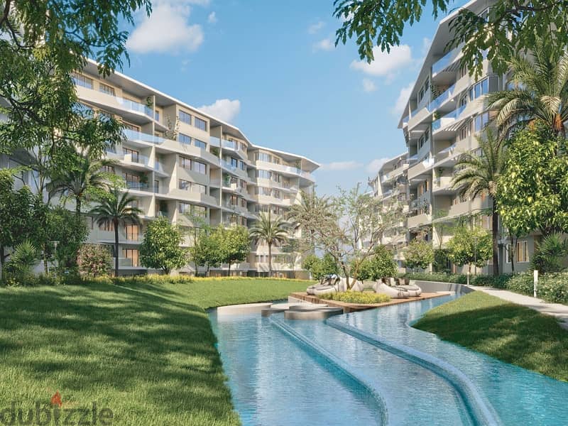 Apartment + garden for sale in installments in front of JW Marriot and near Cairo International Airport in The Median New Cairo 6