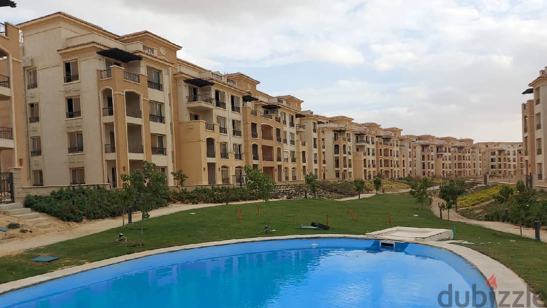 Apartment 175. M in Stone Residence fully finished with kitchen and AC's overlooking lake for sale under market price 8