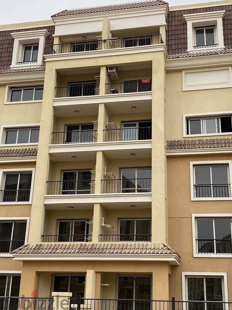 In front of the Capital Airport, own a 94 sqm apartment with a roof in Sarai Compound, New Cairo 0