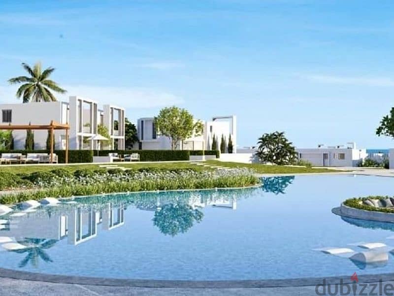 With a 5% down payment, a twin house for sale in installments, fully finished, in a very special location, directly overlooking the sea, in (Live Cira 8