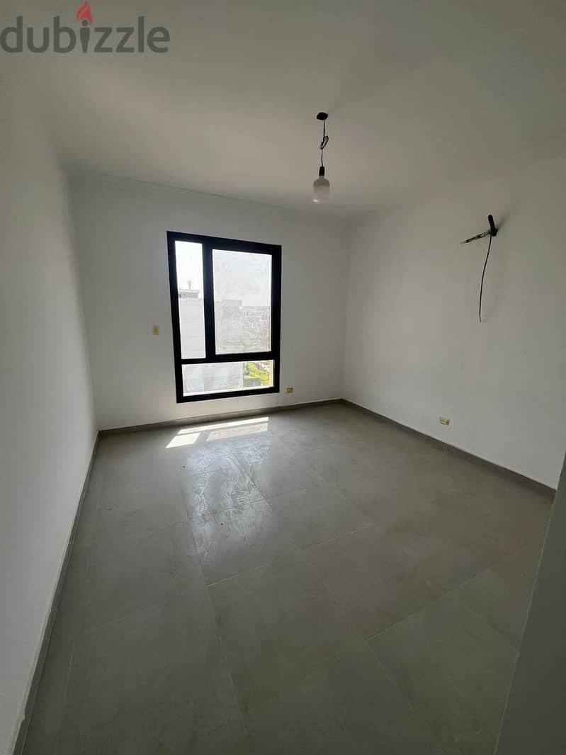 semi furnished Apartment 3rooms prime view for rent in Eastown Sodic new cairo 4