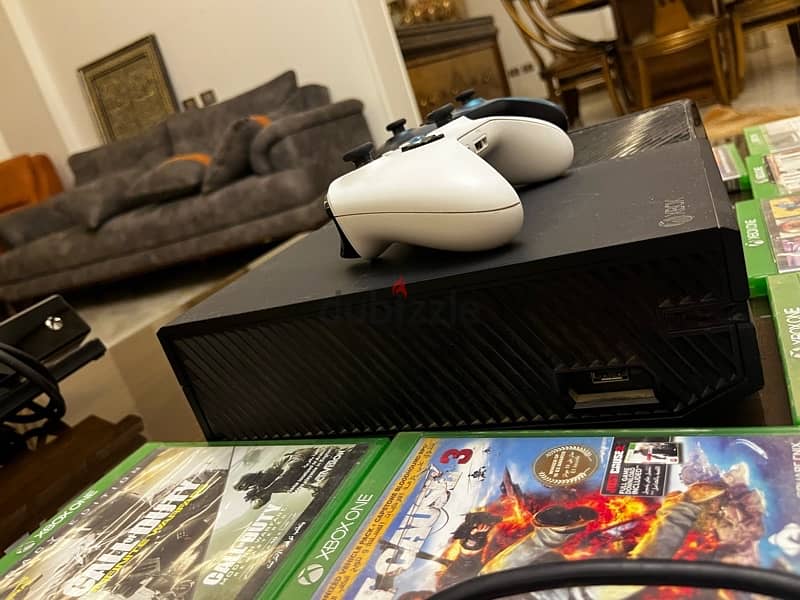 X box one, 1TB + 9 games + kinect + 2 controllers 3