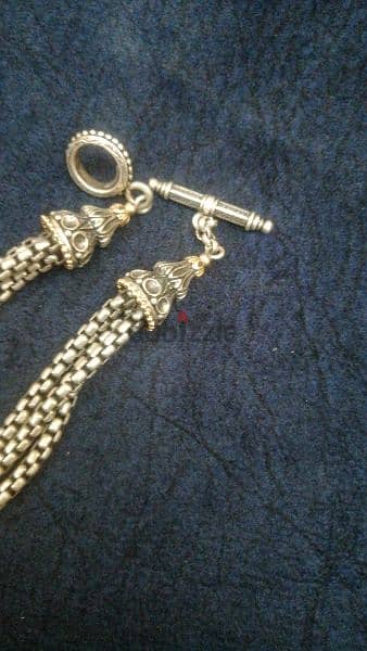 kostantino very famous brand Nicklas sterling silver & gold 18k & onix 8