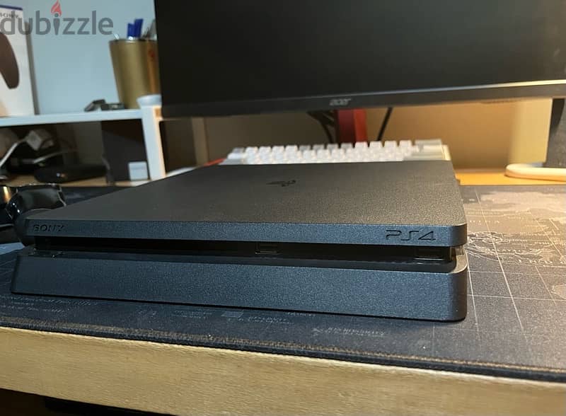 PS4 Slim 1TB, 2 Controllers 1