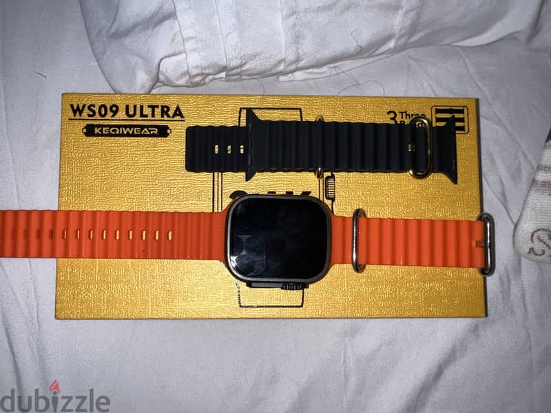 Smart watch With box, charger, black and orange straps 3