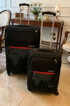 American Tourister luggage set شنط سفر 0