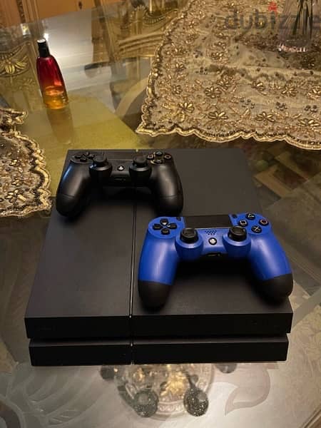 playstation 4 1tb with 2 controllers 0