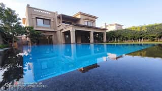Villa for sale in Swan Lake Hassan Allam Compound, directly in front of Al-Rehab