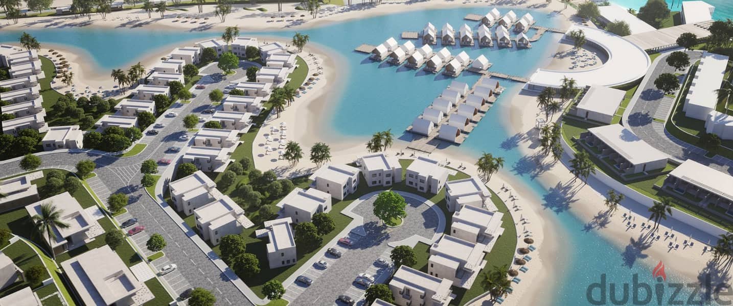 With a 5% down payment over 10 years, a chalet for sale on the lagoon in Ras Al-Hikma, Salt project, North Coast 2