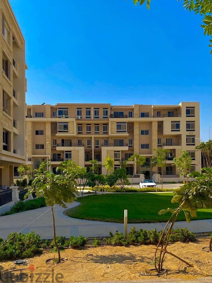 Apartment for sale, 166 sqm, prime location on Suez Road, directly in front of Cairo Airport, Compound Taj City New Cairo 4