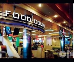 A 45-meter store in the food court, immediate receipt, with a 15% down payment and a 15% discount. The first number on the Al-Amal 0