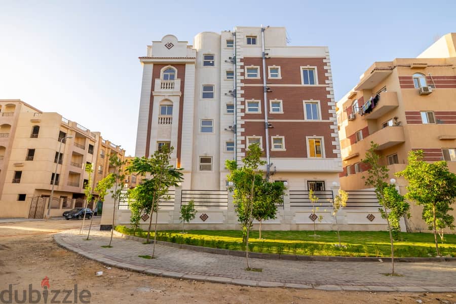 Building for sale in Gardenia, corner on a garden, near Gamal Abdel Nasser axis 0