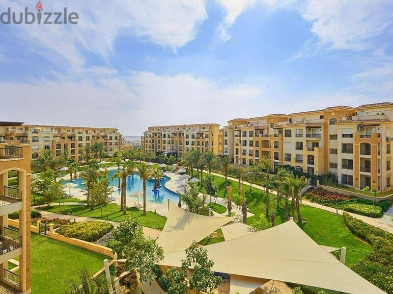 With a cash discount,  own a apartment with a private garden of 112 meters, Ready to move in the heart of New Cairo - Stone Residence 1