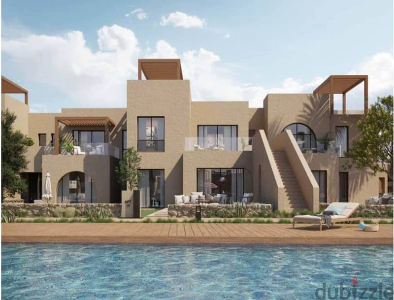 Side twin house for sale, fully finished, with a lagoon view in Makadi Heights, in installments  توين هاوس جانبي مكادي هايتس 2